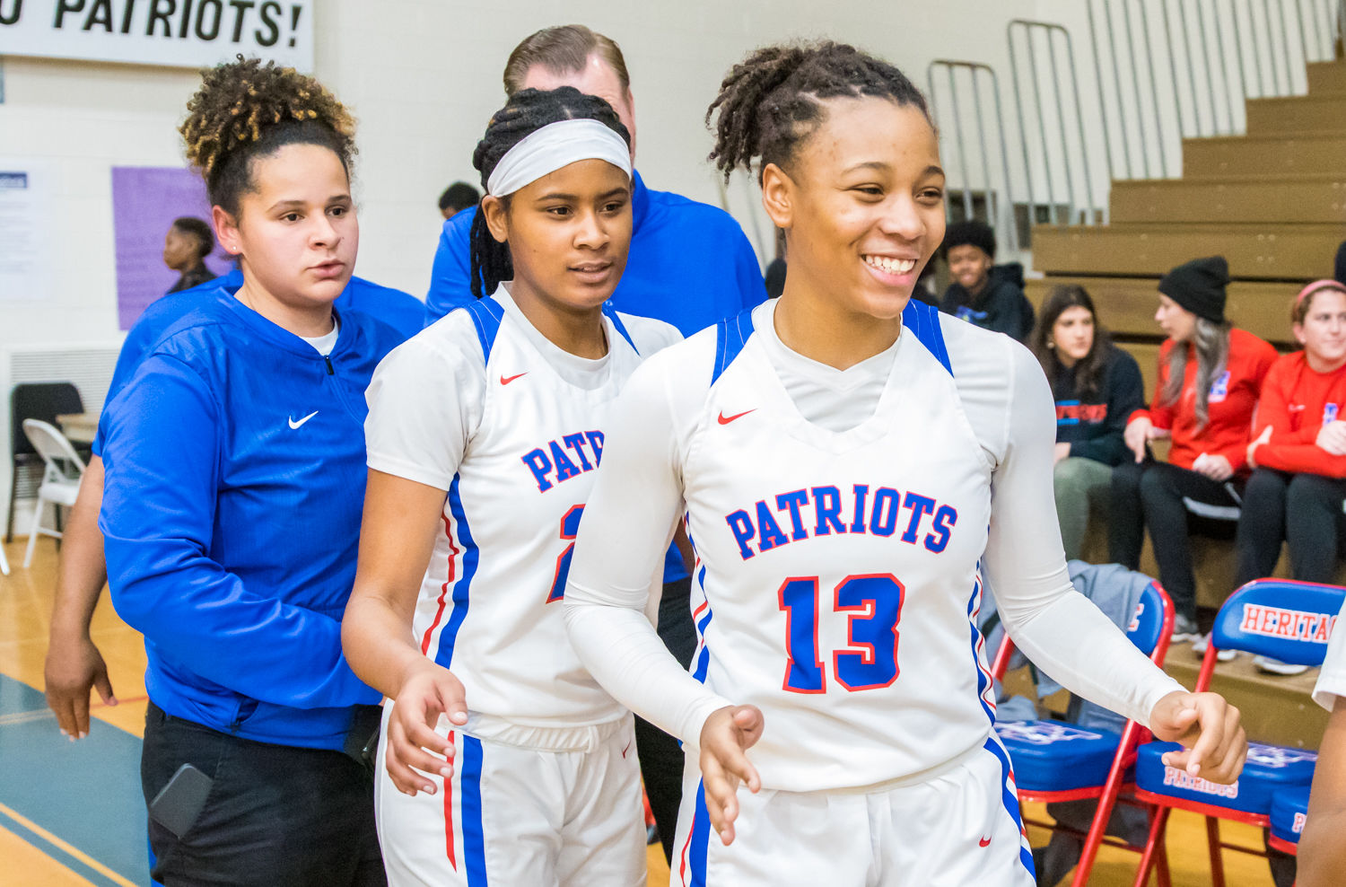 Heritage's Sade Harrell celebrates after defeating Coffee